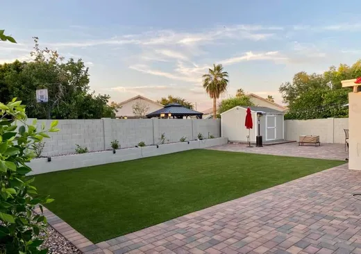 backyard artificial turf in Gilbert AZ beside a paved walkway